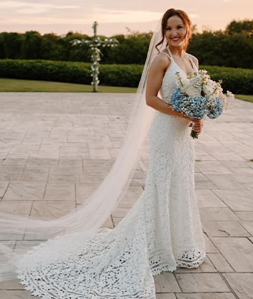 Custom Full Length Long Train white Wedding Dress by Myline's Bridal in Greensboro, NC