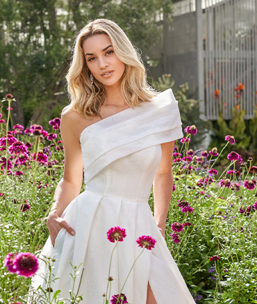 Custom White Wedding Dress photographed in a rose Garden